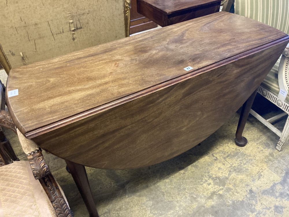 A George III mahogany cottage drop leaf dining table, 122cm, 130cm extended, height 72cm